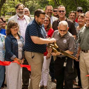 Group of citizens at a ribbon cutting ceremony